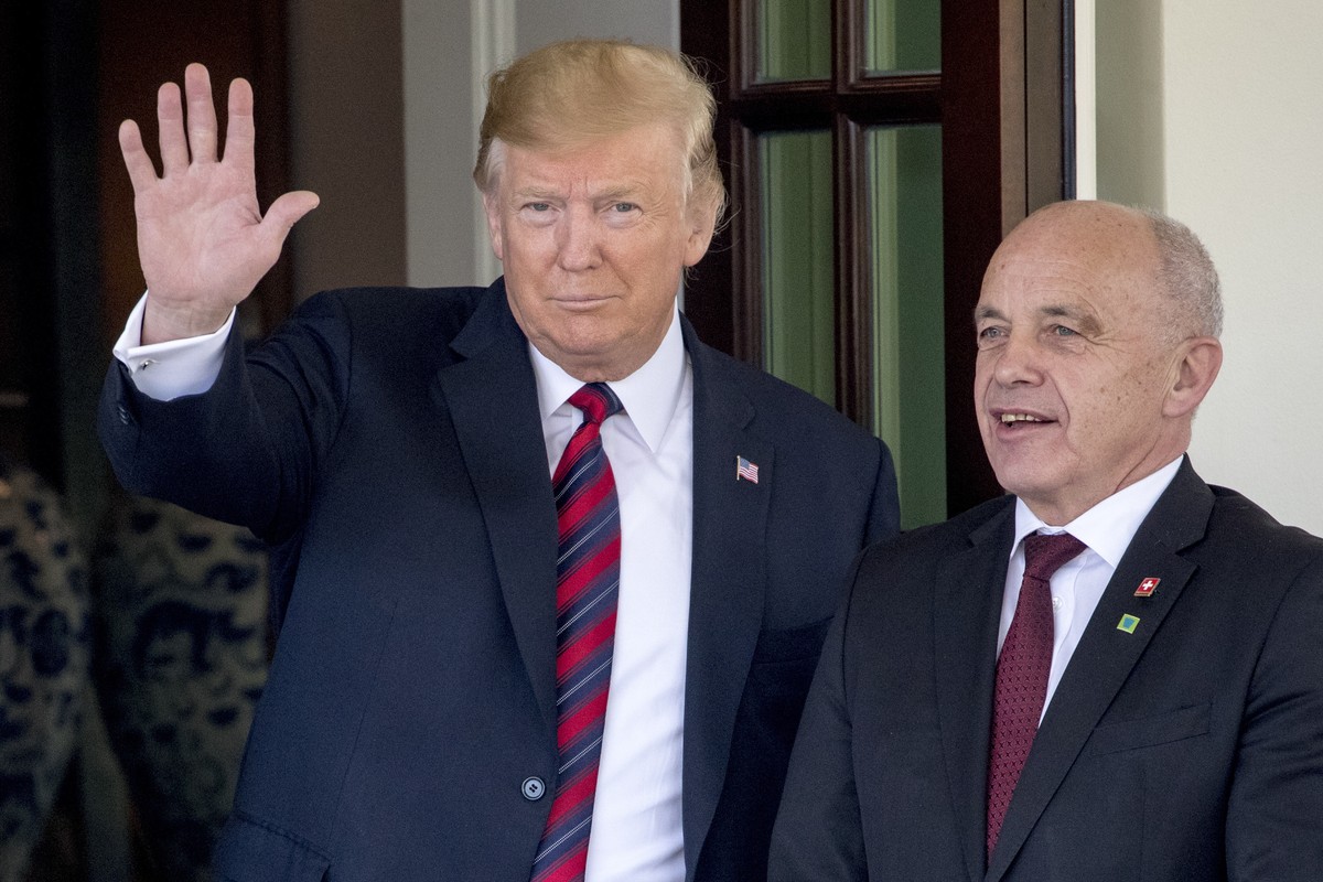 President Donald Trump welcomes Switzerland's Federal President Ueli Maurer, right, to the White House, Thursday, May 16, 2019, in Washington. (AP Photo/Andrew Harnik)