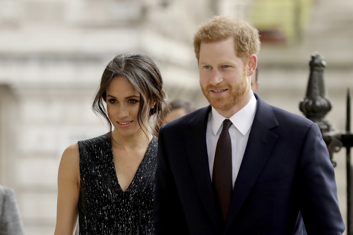Britain's Prince Harry and his fiancee Meghan Markle arrive to attend a Memorial Service to commemorate the 25th anniversary of the murder of black teenager Stephen Lawrence at St Martin-in-the-F ...
