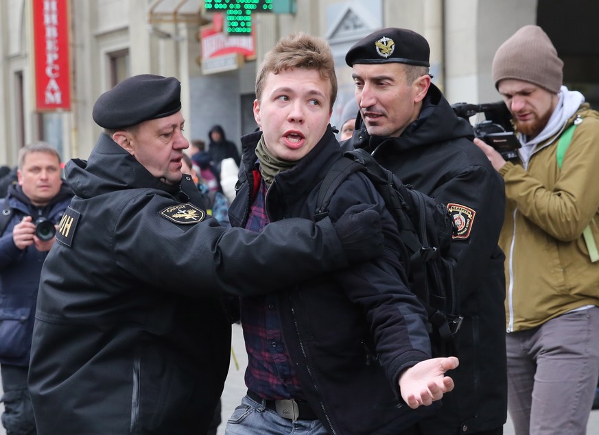 epa09223072 (FILE) Police officers detain a journalist Roman Protasevich attempting to cover a rally in Minsk, Belarus, 26 March 2017 (reissued 23 May 2021). A Ryanair flight from Athens, Greece to Vi ...