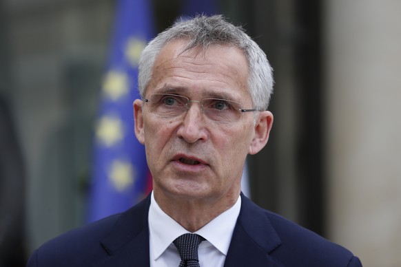 NATO Secretary General Jens Stoltenberg speaks to reporters after his talks with French President Emmanuel Macron at the Elysee palace, Friday, May 21, 2021 in Paris. (AP Photo/Francois Mori)