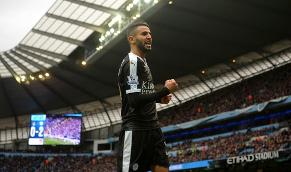 MANCHESTER, ENGLAND - FEBRUARY 06: Riyad Mahrez of Leicester City celebrates scoring his team&#039;s second goal during the Barclays Premier League match between Manchester City and Leicester City at  ...