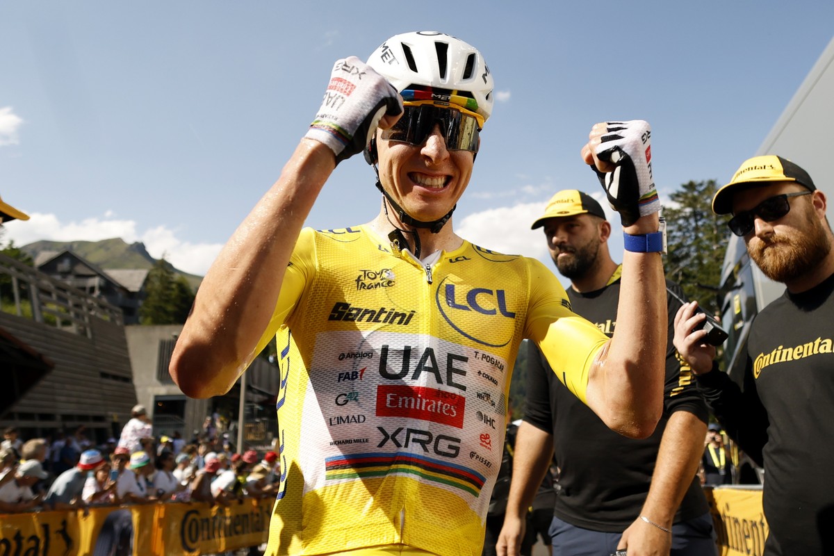 epa13110810 Yellow Jersey overall leader Slovenian cyclist Tadej Pogacar of UAE Team Emirates XRG celebrates in the finish area after winning Stage 10 of the Tour de France, a 166.6 km route from Auri ...