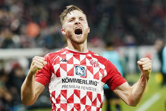 Mainz&#039;s Silvan Widmer of Mainz celebrates his goal to make it 1:1, during the Bundesliga soccer match between Mainz and Borussia Moenchengladbach at Mewa Arena in Mainz, Germany, Friday, Nov. 5,  ...