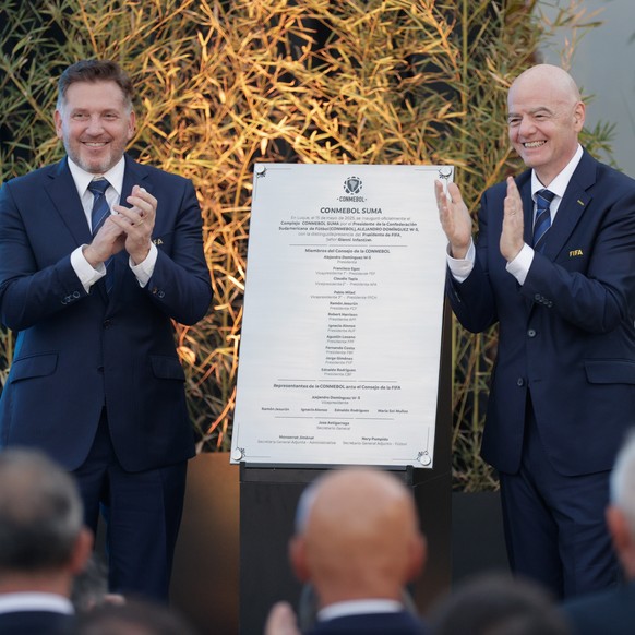 epa12104773 President of the South American Soccer Confederation (CONMEBOL), Alejandro Dominguez (L), and the President of FIFA Gianni Infantino unveil a commemorative plaque during an inauguration ce ...
