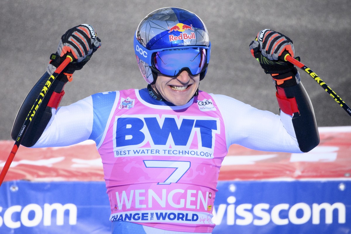 epa09682350 Marco Odermatt of Switzerland reacts in the finish area during the men's Super G race of the FIS Alpine Skiing World Cup in Wengen, Switzerland, 13 January 2022. EPA/PETER SCHNEIDER