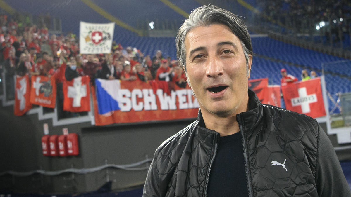 Switzerland's head coach Murat Yakin walks in front of the Switzerland's supporter before the 2022 FIFA World Cup European Qualifying Group C match between Italy and Switzerland at the Stadi ...