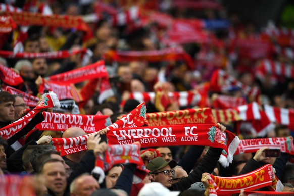 epa07554392 Fans of Liverpool sing You&#039;ll never walk alone before the UEFA Champions League semi final 2nd leg match between Liverpool FC and FC Barcelona at Anfield, Liverpool, Britain, 07 May 2 ...