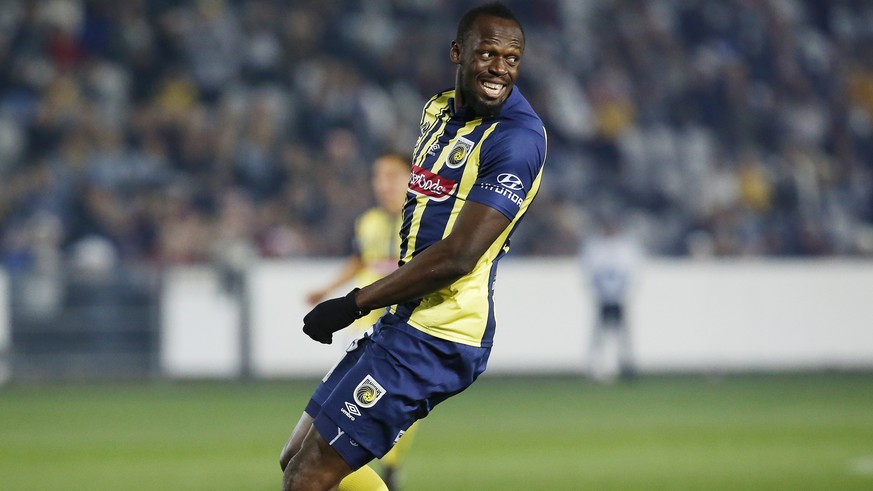 Usain Bolt overruns across the pitch during a friendly trial match between the Central Coast Mariners and the Central Coast Select in Gosford, Australia, Friday, Aug. 31, 2018. Bolt, who holds the wor ...