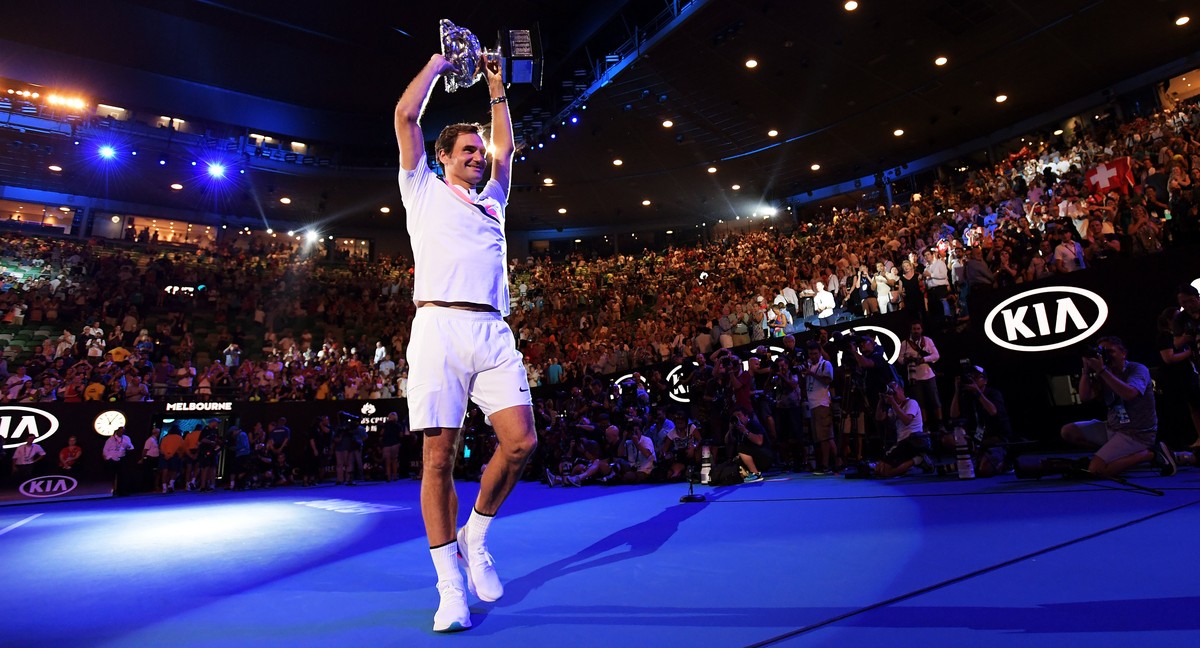 epa06480967 Winner Roger Federer of Switzerland holds his trophy after the awarding ceremony of the men's final match at the Australian Open Grand Slam tennis tournament in Melbourne, Australia,  ...