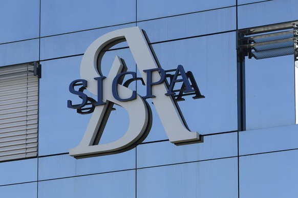 Le logo et le siege de la societe SICPA photographie, ce dimanche 26 octobre 2014 a Prilly (VD). Le leader mondial de l&#039;encre pour billets de banque base dans le canton de Vaud, a lance un plan d ...