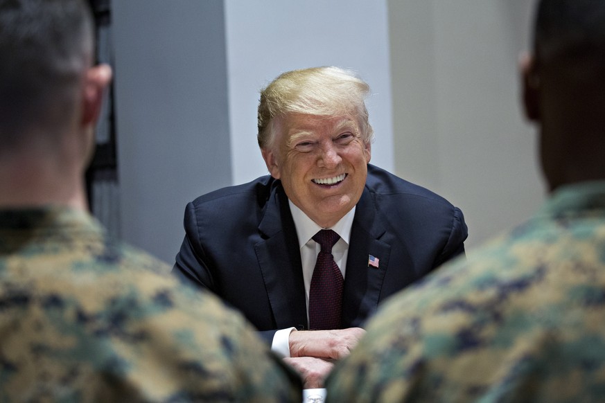 epa07167665 U.S. President Donald J. Trump smiles while speaking to Marines at Marine Barracks in Washington, D.C., USA, 15 November 2018. President Trump and the First Lady are meeting with Marines w ...