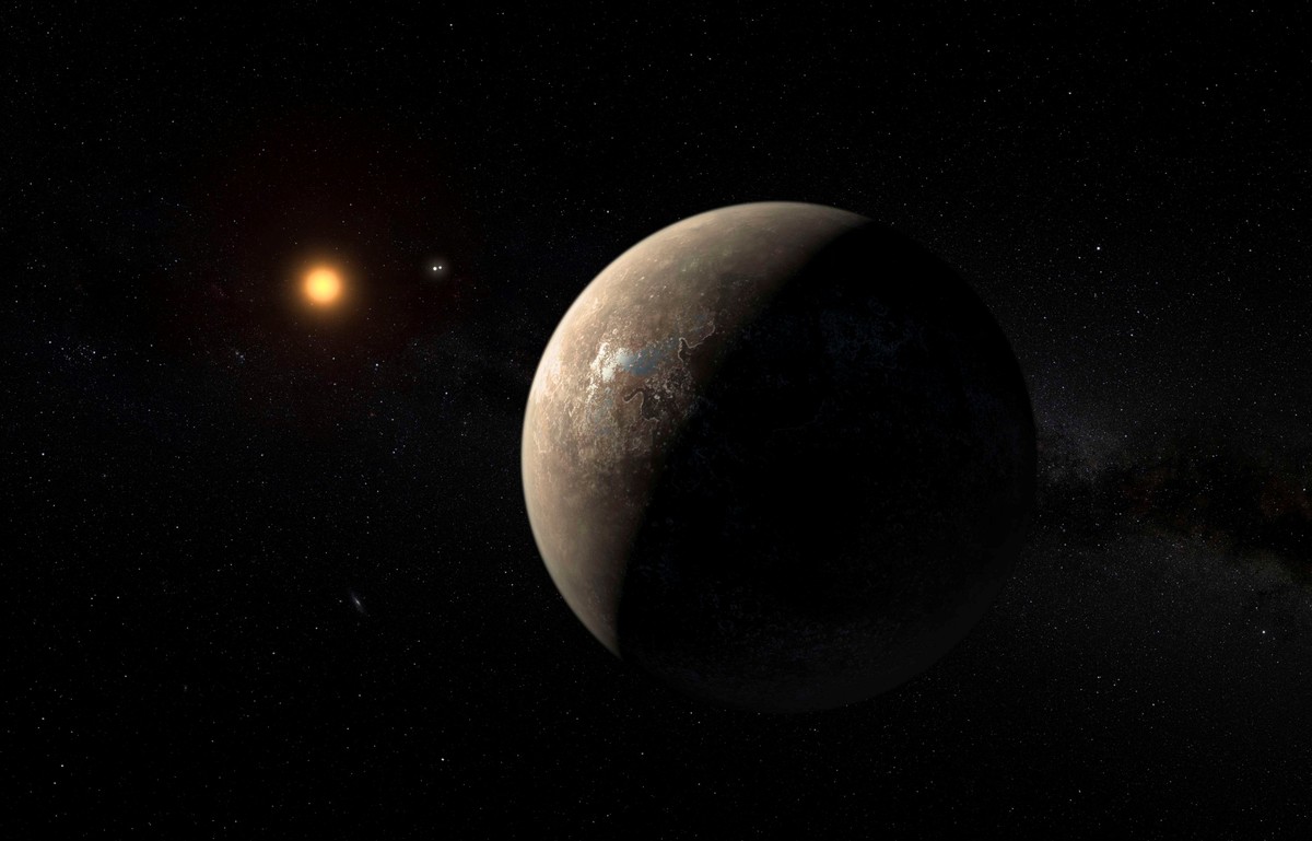The planet Proxima b orbiting the red dwarf star Proxima Centauri, the closest star to our Solar System, is seen in an undated artist's impression released by the European Southern Observatory Au ...