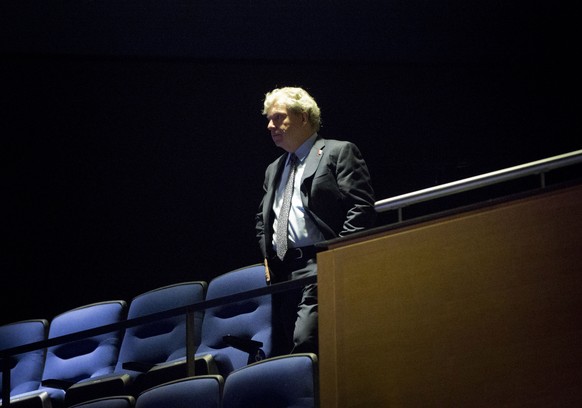 Former White House press secretary for President Bill Clinton, Joe Lockhart looks down from a balcony toward the stage at the Newseum in Washington, Friday, Oct. 10, 2014, prior to the start of a memo ...