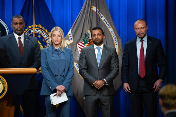 epa12570502 US Attorney General Pam Bondi (2-R), FBI Director Kash Patel (2-R) and FBI Deputy Director Dan Bongino (L) deliver remarks during a press conference at the Department of Justice in Washing ...