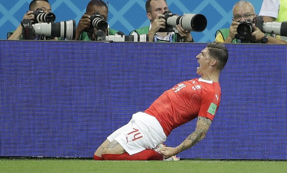 Switzerland&#039;s Steven Zuber celebrates after scoring during the group E match between Brazil and Switzerland at the 2018 soccer World Cup in the Rostov Arena in Rostov-on-Don, Russia, Sunday, June ...