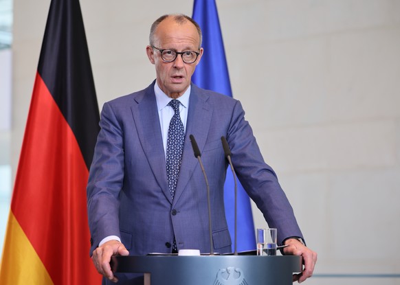 epa12973247 German Chancellor Friedrich Merz attends a news conference after talks with the Swiss President (not pictured) at the Chancellery in Berlin, Germany, 19 May 2026. EPA/HANNIBAL HANSCHKE