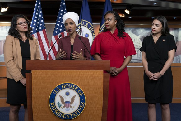 FILE - U.S. Rep. Ilhan Omar, D-Minn speaks, as U.S. Reps., from left, Rashida Tlaib, D-Mich., Ayanna Pressley, D-Mass., and Alexandria Ocasio-Cortez, D-N.Y., listen, during a news conference at the Ca ...