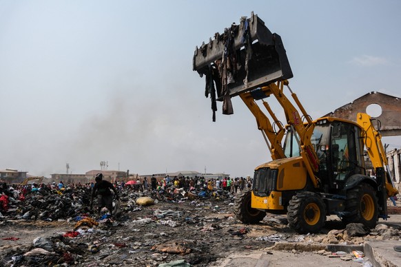 January 4, 2025, Accra, Accra, Ghana: Traders start rebuilding the Kantamanto Market, one of the largest second-hand clothing resale hubs in Ghana, following a fire outbreak on January 2, 2024. Accra  ...