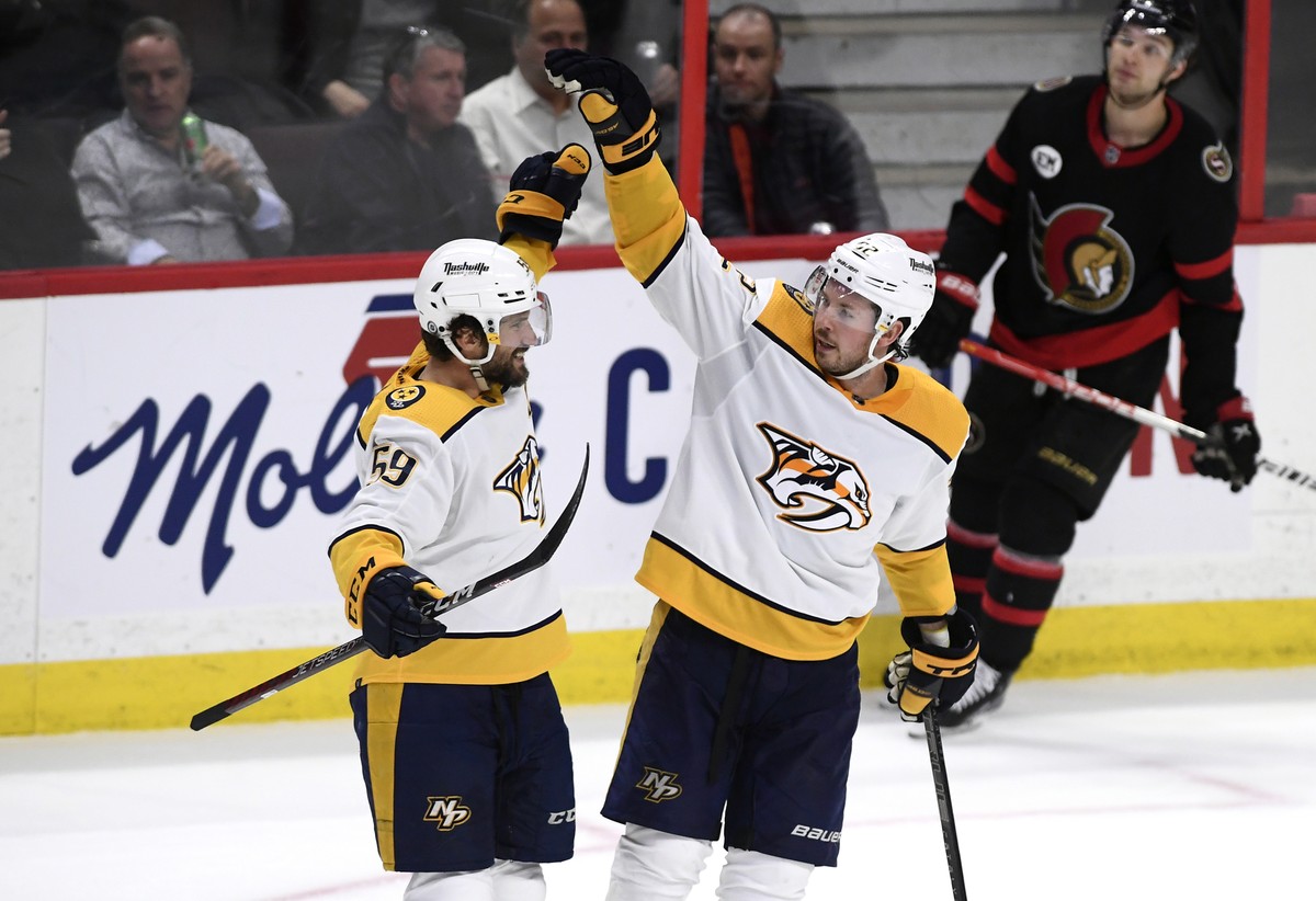Nashville Predators center Ryan Johansen (92) celebrates his goal against the Ottawa Senators with defenseman Roman Josi (59) during the third period of an NHL hockey game Thursday, April 7, 2022 in O ...