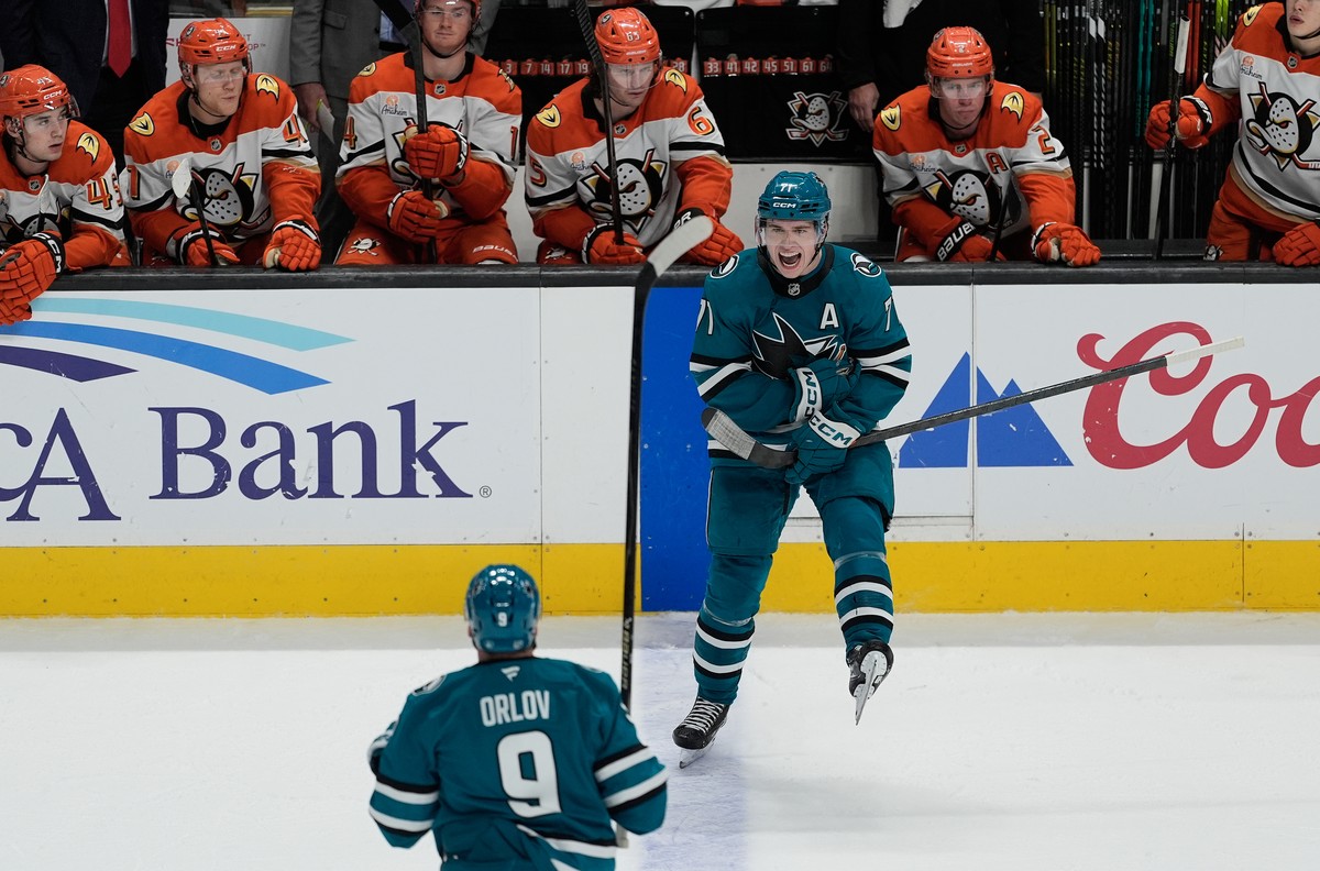 San Jose Sharks center Macklin Celebrini (71) celebrates with defenseman Dmitry Orlov (9) after scoring against the Anaheim Ducks during the third period of an NHL hockey game in San Jose, Calif., Wed ...