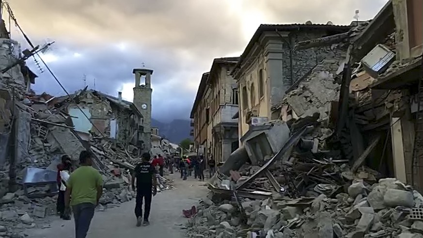 This still image taken from video shows the center of Amatrice, central Italy, where a 6.1 earthquake struck just after 3:30 a.m., Wednesday, Aug. 24, 2016. The quake was felt across a broad section o ...