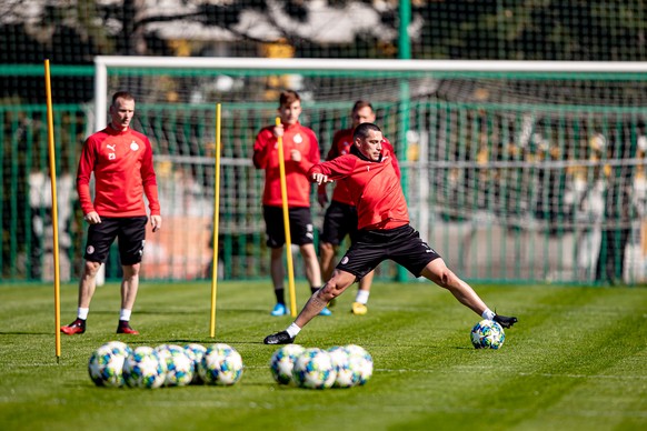 epa08373088 A handout photo made available by Slavia Prague shows player Nicolae Stanciu (R) in action during team&#039;s training session in Prague, Czech Republic, 20 April 2020. Czech government al ...