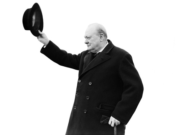 British Prime Minister Winston Churchill, accompanied by his wife Lady Churchill, inspecting the 1st American Squadron of the Home Guard on Horse Guards Parade during the Second World War, 9th January ...