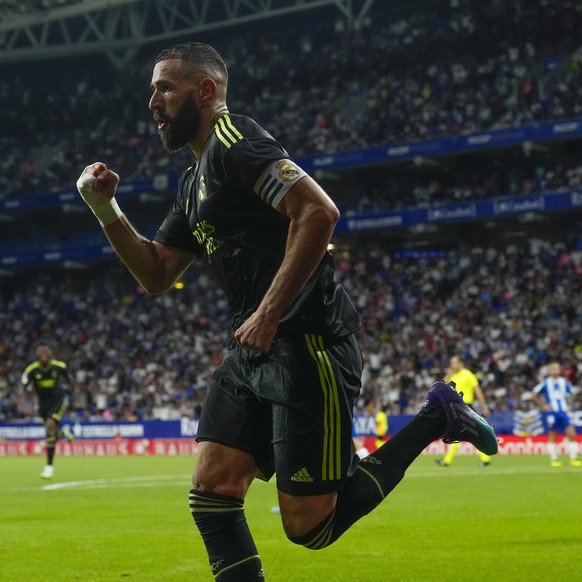 epa10144379 Real Madrid&#039;s striker Karim Benzema celebrates after scoring against RCD Espanyol, during the Spanish LaLiga soccer match between RCD Espanyol and Real Madrid held at RCDE Stadium, in ...