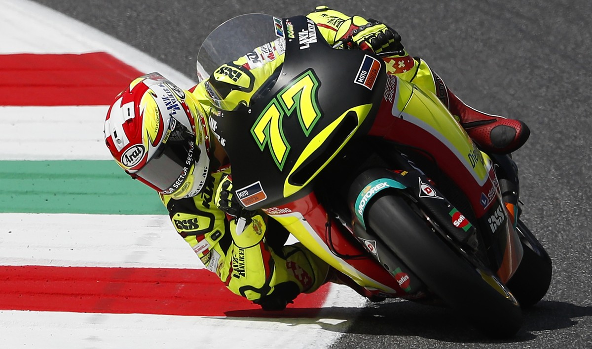 Switzerland rider Dominique Aegerter steers his KTM during the qualifying session for the Sunday's Italian Moto2 grand prix at the Mugello circuit, in Scarperia, Italy, saturday, June 2, 2018. (A ...