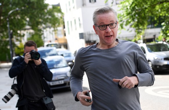 epaselect epa07607052 British Environment Secretary Michael Gove returns to his home following a run in London, Britain, 28 May 2019. Gove has announced his intentions to run for Prime Minister in the ...