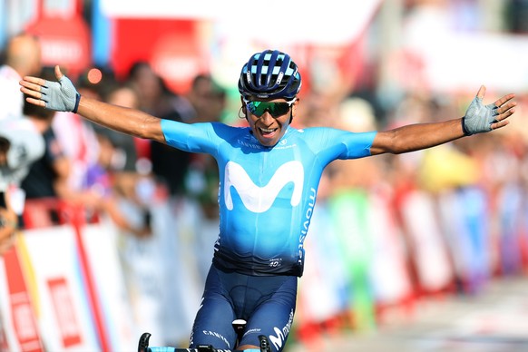 epa07793254 Colombian cyclist Nairo Quintana of Movistar team celebrates winning the second stage of the La Vuelta cycling race over 199.6km from Benidorm to Calpe, eastern Spain, 25 August 2019. EPA/ ...