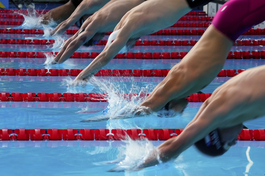 Competitors start the men&#039;s 4 x 200-meters freestyle relay final at the Pan American Games in Santiago, Chile, Tuesday, Oct. 24, 2023. (AP Photo/Natacha Pisarenko)
