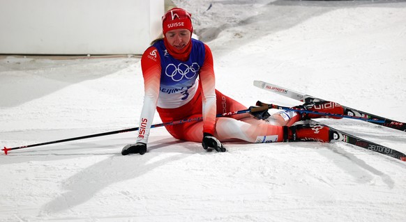 epa09738333 Nadine Faehndrich of Switzerland reacts after the Women&#039;s Individual Sprint final at the Zhangjiakou National Cross-Country Skiing Centre at the Beijing 2022 Olympic Games in Zhangjia ...