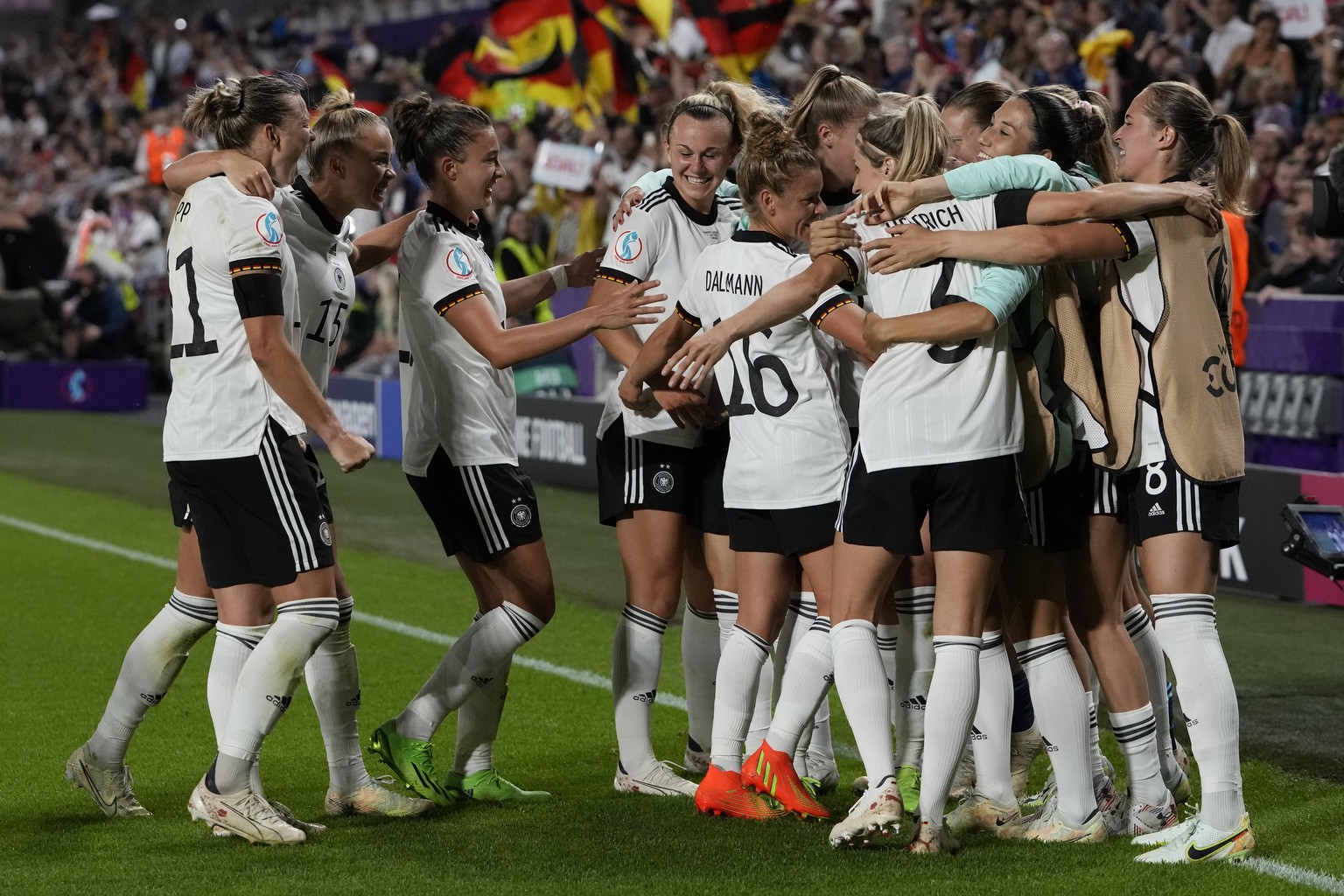 Germany&#039;s team players celebrate after scoring their side&#039;s second goal during the Women Euro 2022 quarter final soccer match between Germany and Austria at Brentford Community Stadium in Lo ...