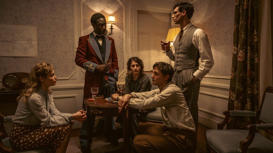 Gillian Jacobs as Mary Jayne Gold, Ralph Amoussou as Paul Diallo, Deleila Piasko as Lisa Fittko, Lucas Englander as Albert Hirschmann, Cory Michael Smith as Varian Fry in Transatlantic, Courtesy of Ne ...