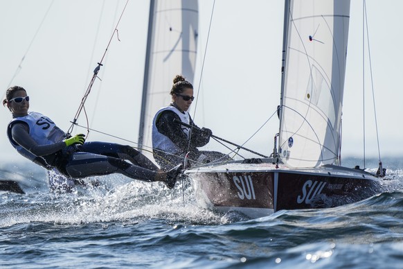 Switzerland&#039;s Maja Siegenthaler and Linda Fahrni compete during the 470 women race at the Enoshima harbour during the 2020 Summer Olympics, Wednesday, July 28, 2021, in Fujisawa, Japan. (AP Photo ...