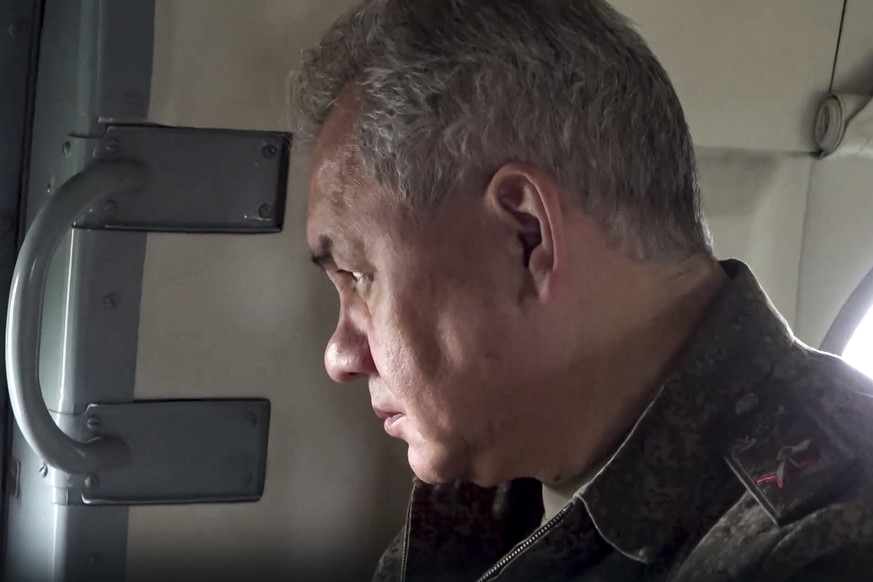 In this photo from a video released on Monday, June 26, 2023 by the press service of the Russian Ministry of Defense, Russian Defense Minister Sergei Shoigu is aboard a military helicopter on his way to in…