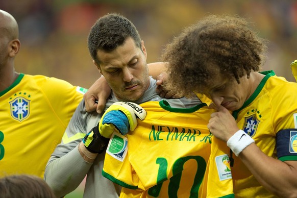 Belo Horizonte, MG - 08/07/2014: BRAZIL X GERMANY - JULIO CESAR DAVID LUIZ of Brazil and the Brazil national anthem sing holding the shirt Neymar JR during the match between Brazil vs Germany, valid f ...