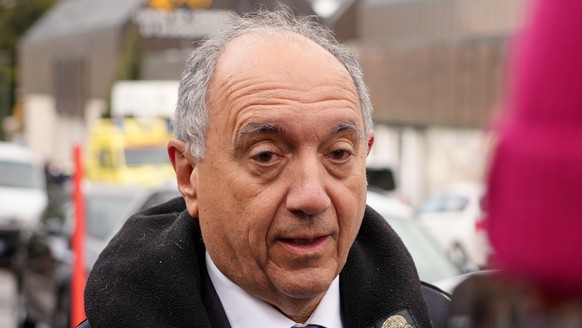 Italian ambassador Gian Lorenzo Cornado talks to the media outside a reception centre near the sealed off Le Constellation bar in Crans-Montana, Swiss Alps, Switzerland, Saturday, Jan. 3, 2026, where  ...