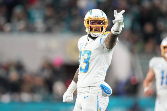 January 14, 2023, Jacksonville, Florida, USA: Los Angeles Chargers wide receiver Keenan Allen 13 points for q first down after his reception during the wild card playoff game between the Los Angeles C ...