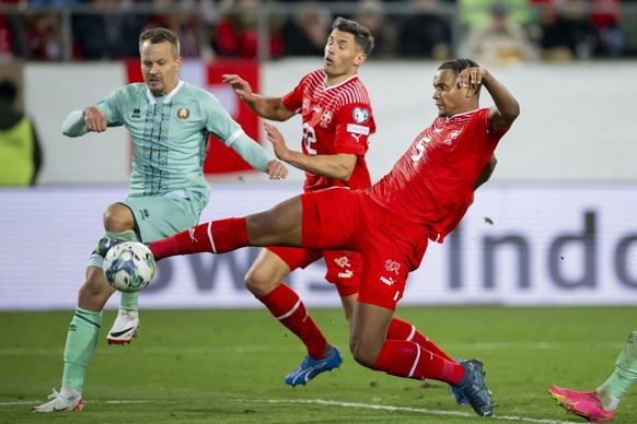 Switzerland&#039;s defender Manuel Akanji scores the 2:3 goal during the UEFA Euro 2024 qualifying group I soccer match between Switzerland and Belarus, at the Kybunpark stadium in St. Gallen, Switzer ...