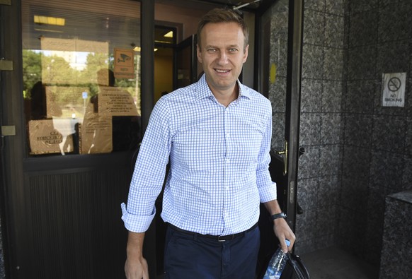 Russian opposition activist Alexei Navalny leaves a court in Moscow, Russia, Monday, June 24, 2019. The court adjourned it&#039;s session in the case of Navalny, who is accused of taking part in an un ...