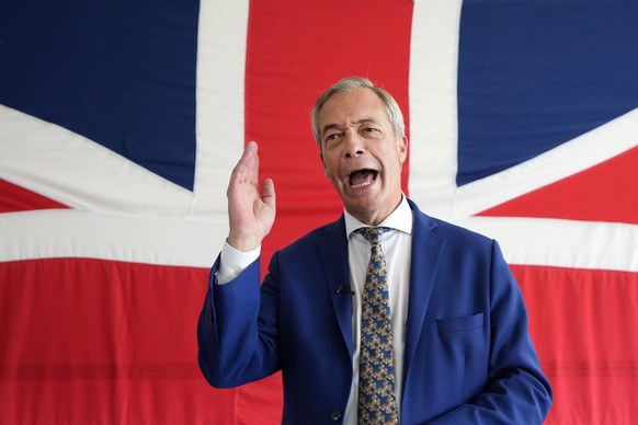 Britain&#039;s Reform UK party leader Nigel Farage is interviewed by Associated Press at their headquarters in Clacton-On-Sea, Essex, England, Friday, June 21, 2024. (AP Photo/Kirsty Wigglesworth)