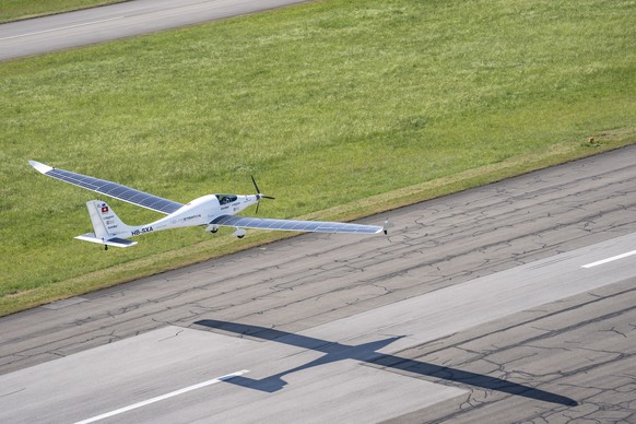 SolarStratos, a solar powered aircraft prototype, flown by Swiss adventurer Raphael Domjan during takeoff at Payerne Airport, Switzerland, Tuesday, June 24, 2025. (KEYSTONE/Til Buergy)