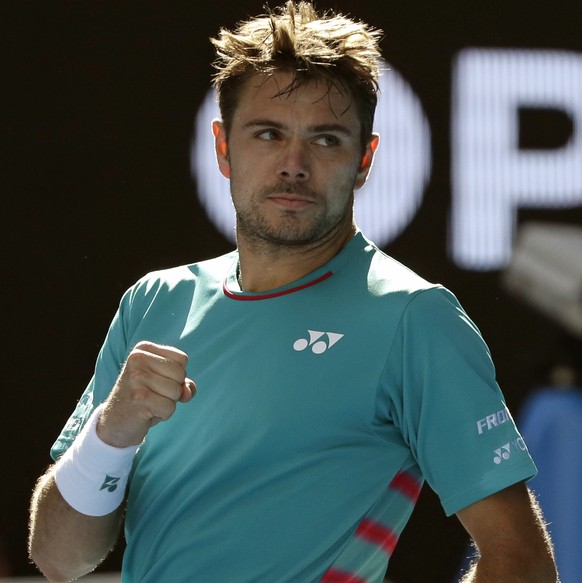 Switzerland&#039;s Stan Wawrinka celebrates a point win over Serbia&#039;s Viktor Troicki during their third round match at the Australian Open tennis championships in Melbourne, Australia, Friday, Ja ...