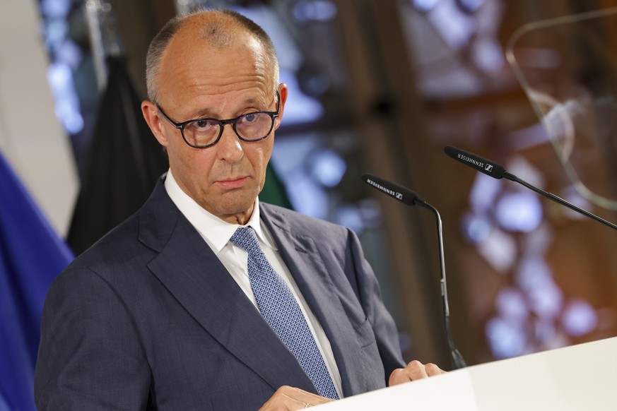 epa13274988 German Chancellor Friedrich Merz delivers a speech during the award ceremony of the 2026 International Westphalian Peace Prize, in Muenster, Germany, 01 October 2026. NATO received the 202 ...