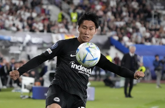 Frankfurt&#039;s Daichi Kamada kicks the ball during the UEFA Super Cup final soccer match between Real Madrid and Eintracht Frankfurt at Helsinki&#039;s Olympic Stadium, Finland, Wednesday, Aug. 10,  ...