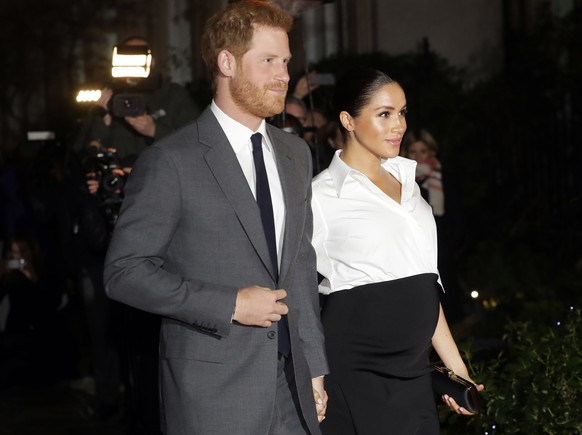 FILE - In this Thursday, Feb. 7, 2019 file photo, Britain&#039;s Prince Harry and Meghan, Duchess of Sussex arrive at the annual Endeavour Fund Awards in London. The child of Meghan Markle and Prince  ...