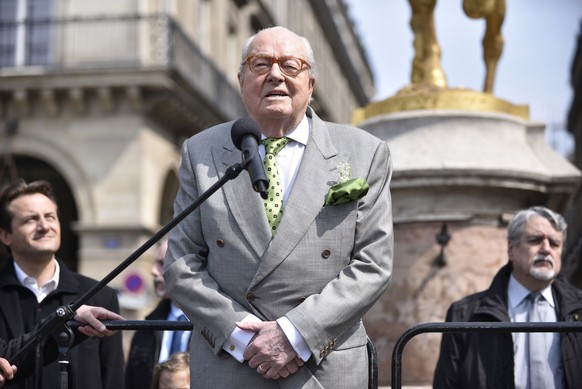 epa07539726 Former President of the Front National (FN) Jean-Marie Le Pen speaks at the statue of Joan of Arc during a traditional May Day rally in Paris, France, 01 May 2019. Labour Day or May Day is ...
