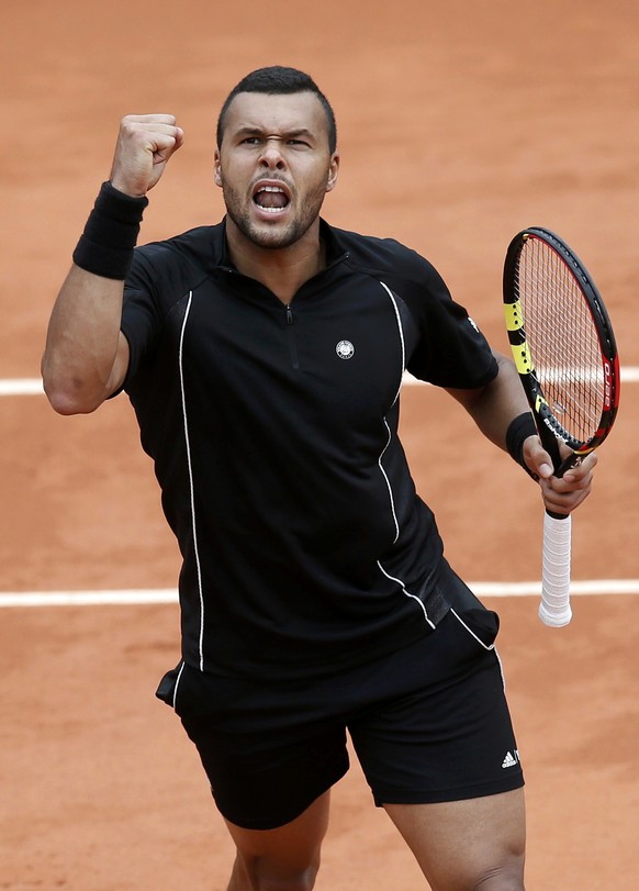 Jo-Wilfried Tsonga of France reacts during the men&#039;s singles match against Tomas Berdych of the Czech Republic at the French Open tennis tournament at the Roland Garros stadium in Paris, France,  ...